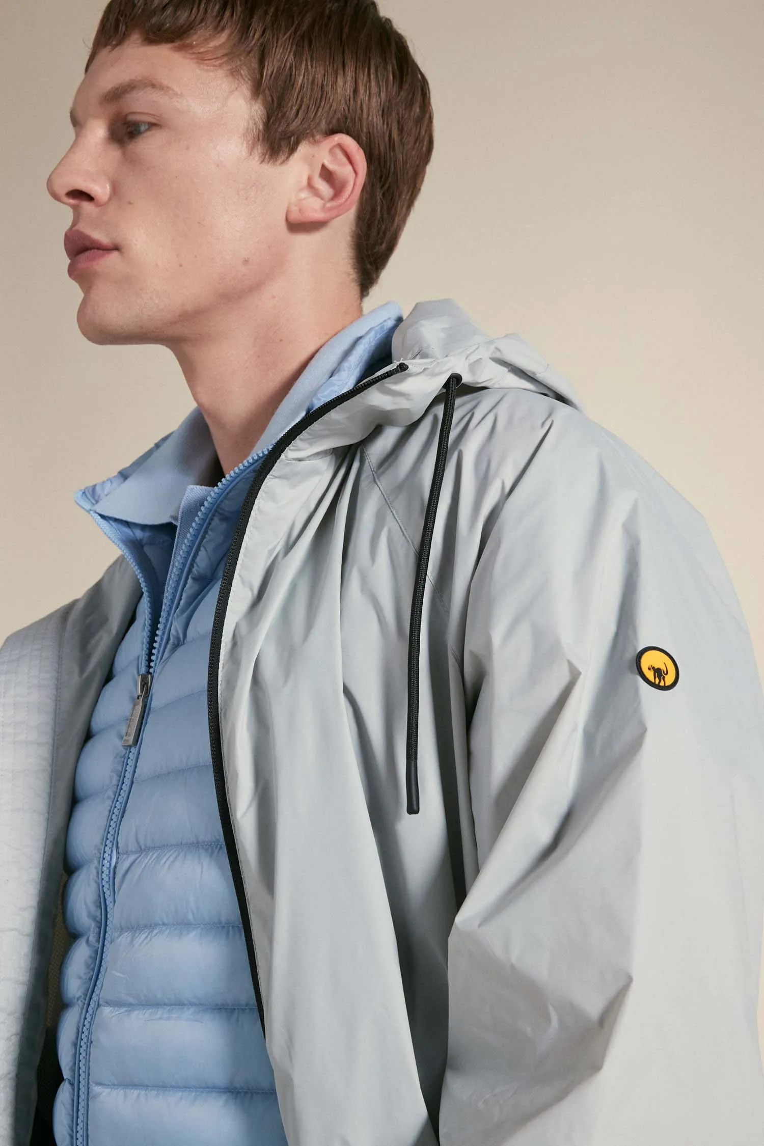 MARLIN – Windbreaker grigio impacchettabile con cappuccio