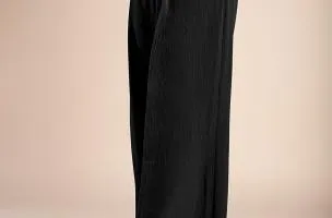Pantaloni lunghi eleganti con bottoni, neri.