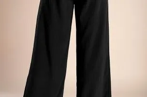 Pantaloni lunghi eleganti con bottoni, neri.