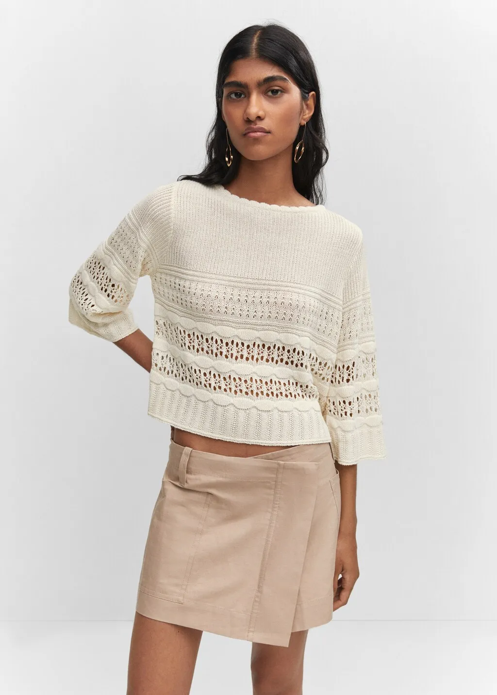 Pullover traforato maniche scampanate